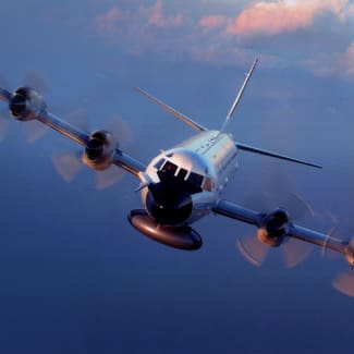 A propeller plane flying through the air